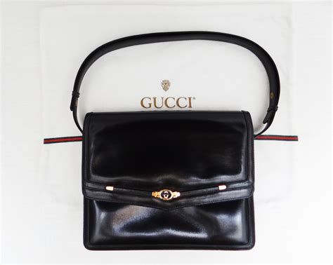 gucci plain black leather handbag vintage|authentic vintage Gucci crossbody bag.